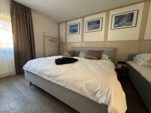 Posteľ alebo postele v izbe v ubytovaní UNTERBERG Apartment