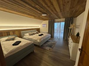 Posteľ alebo postele v izbe v ubytovaní UNTERBERG Apartment