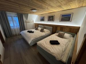 Posteľ alebo postele v izbe v ubytovaní UNTERBERG Apartment