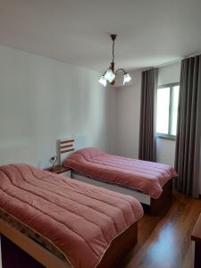 Ένα ή περισσότερα κρεβάτια σε δωμάτιο στο Marina Kings View