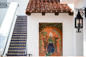 a mural on the side of a building with a staircase at Omni La Costa Resort & Spa Carlsbad in Carlsbad +151 photos
