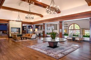 an open living room with a table and chairs at Omni La Costa Resort & Spa Carlsbad in Carlsbad