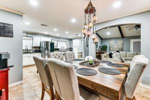 a kitchen and dining room with a table and chairs at 3 Mi to Downtown McAllen Quiet Home with Pool in McAllen