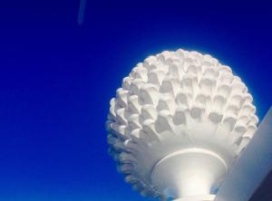 a white light fixture with a blue background at Playa del Mar - Adults Only in Monopoli
