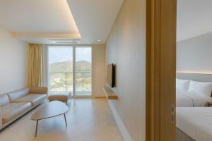 Sol Beach Jindo客房内的一张或多张床位