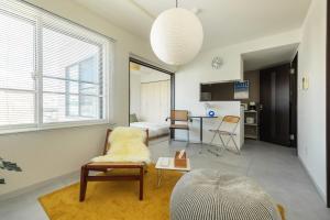 Kuchyň nebo kuchyňský kout v ubytování Cozy Stay Sapporo East