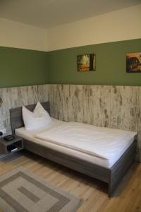Postel nebo postele na pokoji v ubytování Meyerhof Heiligenrode
