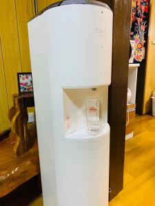 Foto sihtkohas Nago asuva majutusasutuse 広い畳間と外には広いウッドデッキCondominium和風邸Yanbaru galeriist