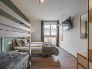Ein Bett oder Betten in einem Zimmer der Unterkunft Emma Top 1 XL
