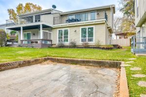 a house with a driveway in front of it at Walk to Lake Conroe Family-Friendly Getaway! in Montgomery