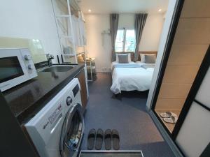 Beyond Residence Jongnoにあるベッド