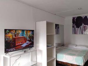 TV a/nebo společenská místnost v ubytování Hostel Barranco Sunset