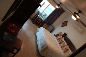 Postel nebo postele na pokoji v ubytování Casa Costa Azul