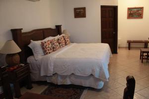 Postel nebo postele na pokoji v ubytování Casa Costa Azul