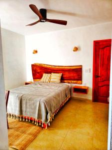 Postel nebo postele na pokoji v ubytování Casa Flores + 5 fotografií