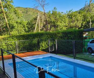 una piscina con una valla alrededor en Don EDELMI 2, en Córdoba