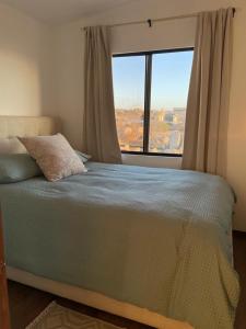 Voodi või voodid majutusasutuse Cabaña Amanecer en Aurora Cabin & Glamping toas