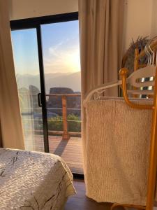 Voodi või voodid majutusasutuse Cabaña Amanecer en Aurora Cabin & Glamping toas