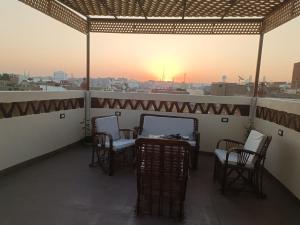 Balkón nebo terasa v ubytování Nubian Soul Guest Houses