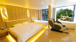 Postel nebo postele na pokoji v ubytování Yibuxuan Boutique Hotel Yangshuo