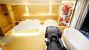 Postel nebo postele na pokoji v ubytování Yibuxuan Boutique Hotel Yangshuo