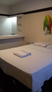 Tempat tidur dalam kamar di Vista Maravilhosa 706