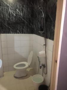 Koupelna v ubytování JOHNFONZ BUILDING Affordable Room