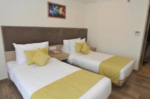 Postel nebo postele na pokoji v ubytování Royale Lalit Hotel Jaipur