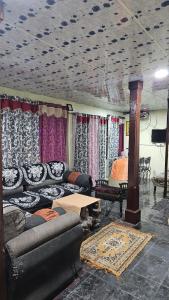 Et opholdsområde på Prayani - Varma Guest House