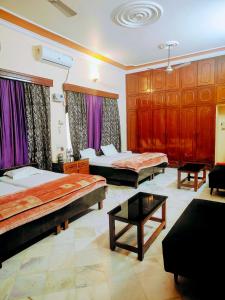 Postel nebo postele na pokoji v ubytování Shantiniketan 2 BHK Homestay in Ayodhya