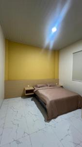 Postel nebo postele na pokoji v ubytování Slara Hostel Syariah + 17 fotografií