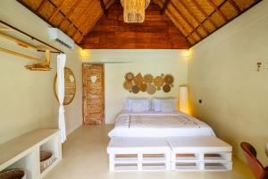 Ένα ή περισσότερα κρεβάτια σε δωμάτιο στο Villa Laguna