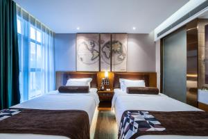 Katil atau katil-katil dalam bilik di James Joyce Coffetel Beijing Daxing International Airport Branch 2