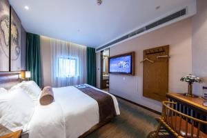 Katil atau katil-katil dalam bilik di James Joyce Coffetel Beijing Daxing International Airport Branch 2