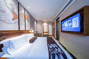Katil atau katil-katil dalam bilik di James Joyce Coffetel Beijing Daxing International Airport Branch 2