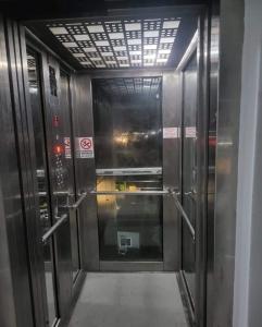 an elevator in a subway train with the door open at SAB Luxury Apartaments 2 Saturn in Saturn