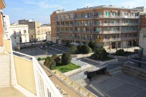 a view of a building from a balcony at Le Lune di Diana in Matera