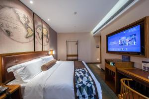 Televisyen dan/atau pusat hiburan di James Joyce Coffetel Beijing Daxing International Airport Branch 2 +30 gambar