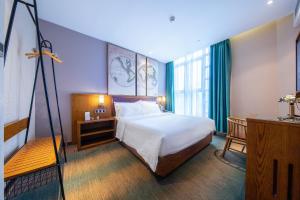 Katil atau katil-katil dalam bilik di James Joyce Coffetel Beijing Daxing International Airport Branch 2