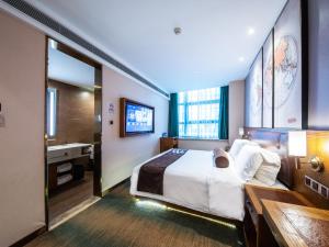 Katil atau katil-katil dalam bilik di James Joyce Coffetel Beijing Daxing International Airport Branch 2