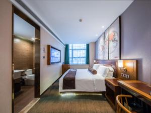 Katil atau katil-katil dalam bilik di James Joyce Coffetel Beijing Daxing International Airport Branch 2