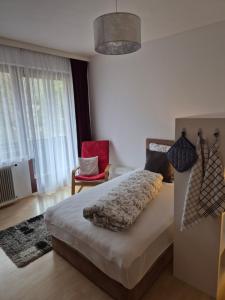 Łóżko lub łóżka w pokoju w obiekcie Haus Zedlacher