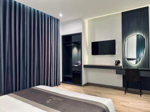 Postel nebo postele na pokoji v ubytování LION 15 Hotel