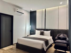 Postel nebo postele na pokoji v ubytování LION 15 Hotel