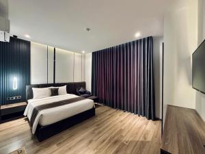 Postel nebo postele na pokoji v ubytování LION 15 Hotel