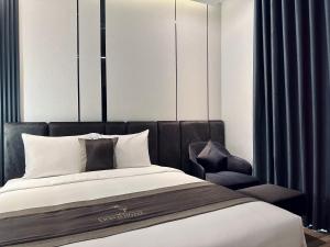 Postel nebo postele na pokoji v ubytování LION 15 Hotel