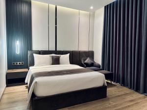 Postel nebo postele na pokoji v ubytování LION 15 Hotel