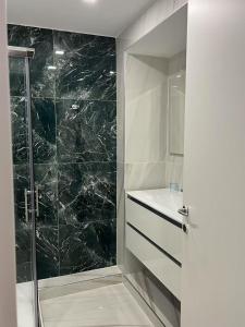 a bathroom with a shower and a sink at Vatican museum guest house in Rome
