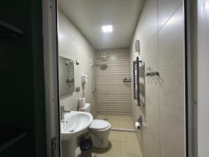 Ένα μπάνιο στο Porta Hostel