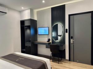 Postel nebo postele na pokoji v ubytování LION 15 Hotel